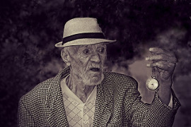 Old Man watching as time passes him by